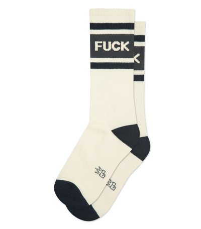 Natural cotton socks with cream accents, black text "FUCK" and smaller symbols.