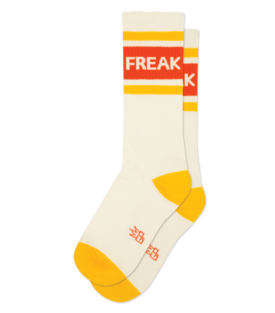 Natural cotton socks with cream accents. The text "FREAK" on red band. Yellow toe and heel caps.