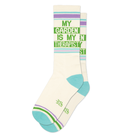 Sock with "MY GARDEN IS MY THERAPIST" text, natural cotton color, green accents, no background.