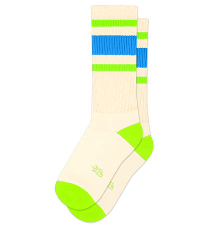 Pair of natural cotton socks with bright blue and green accents, no background.