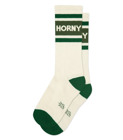 Alt text: "Natural cotton socks with dark olive green accents, featuring 'HORNY' text and heel design."