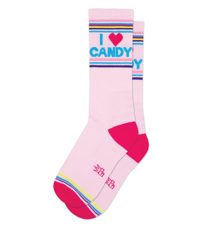 Pink socks with neon yellow accents featuring the text "I ♥ CANDY" and colorful stripes.