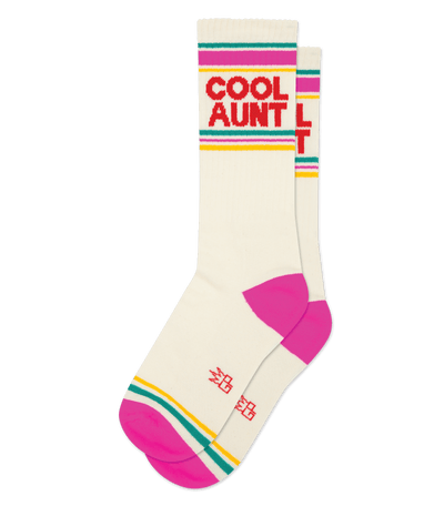 Natural cotton socks with "Cool Aunt" text, gold accents, rainbow stripes, and pink heels and toes.