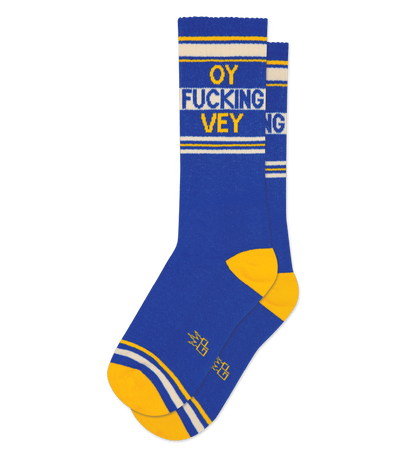 Blue sock with gold accents and text on the cuff; no background.