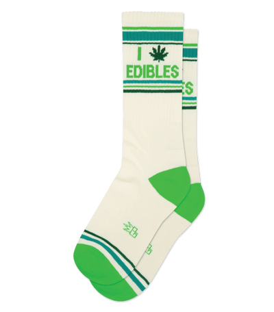 Cream socks with teal accents, text reads "I [cannabis leaf] EDIBLES," featuring stripes and heel/toe color.